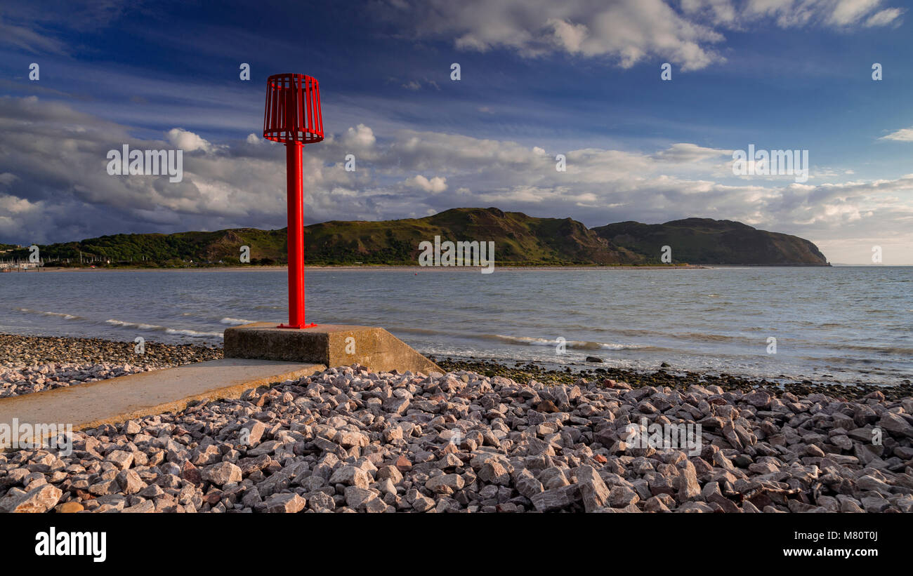 Red outflow marker on the North Wales coast at Llandudno Stock Photo