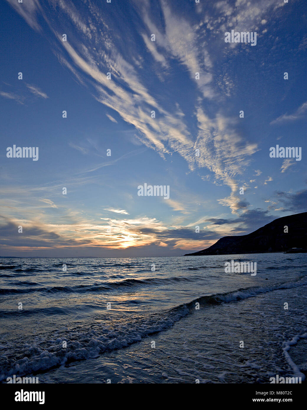 sunset over the North Wales coast at Llandudno West shore Stock Photo