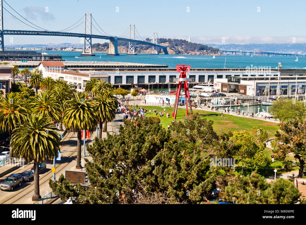 An elevated view of the Embarcadero in San Francisco, CA with the Bay Bridge and Treasure Island in the background. Stock Photo