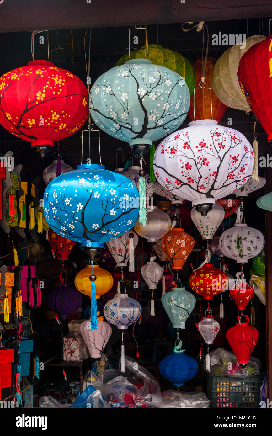 Paper and cloth lanterns lamp light shades for sale in a shop in Hoi An, Vietnam Stock Photo