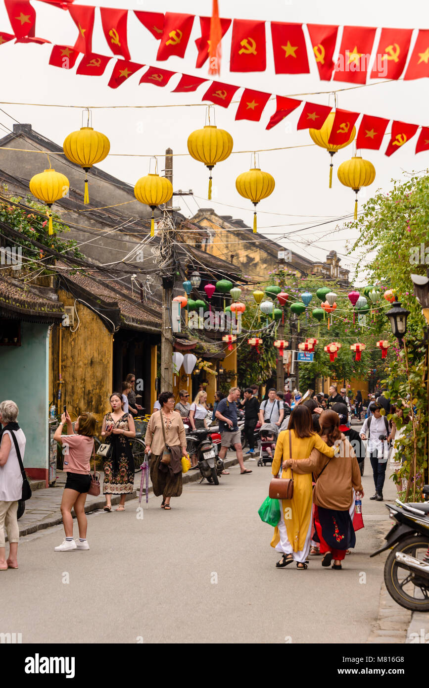Colourful paper lanterns hang across the street in Hoi An, Vietnam Stock Photo