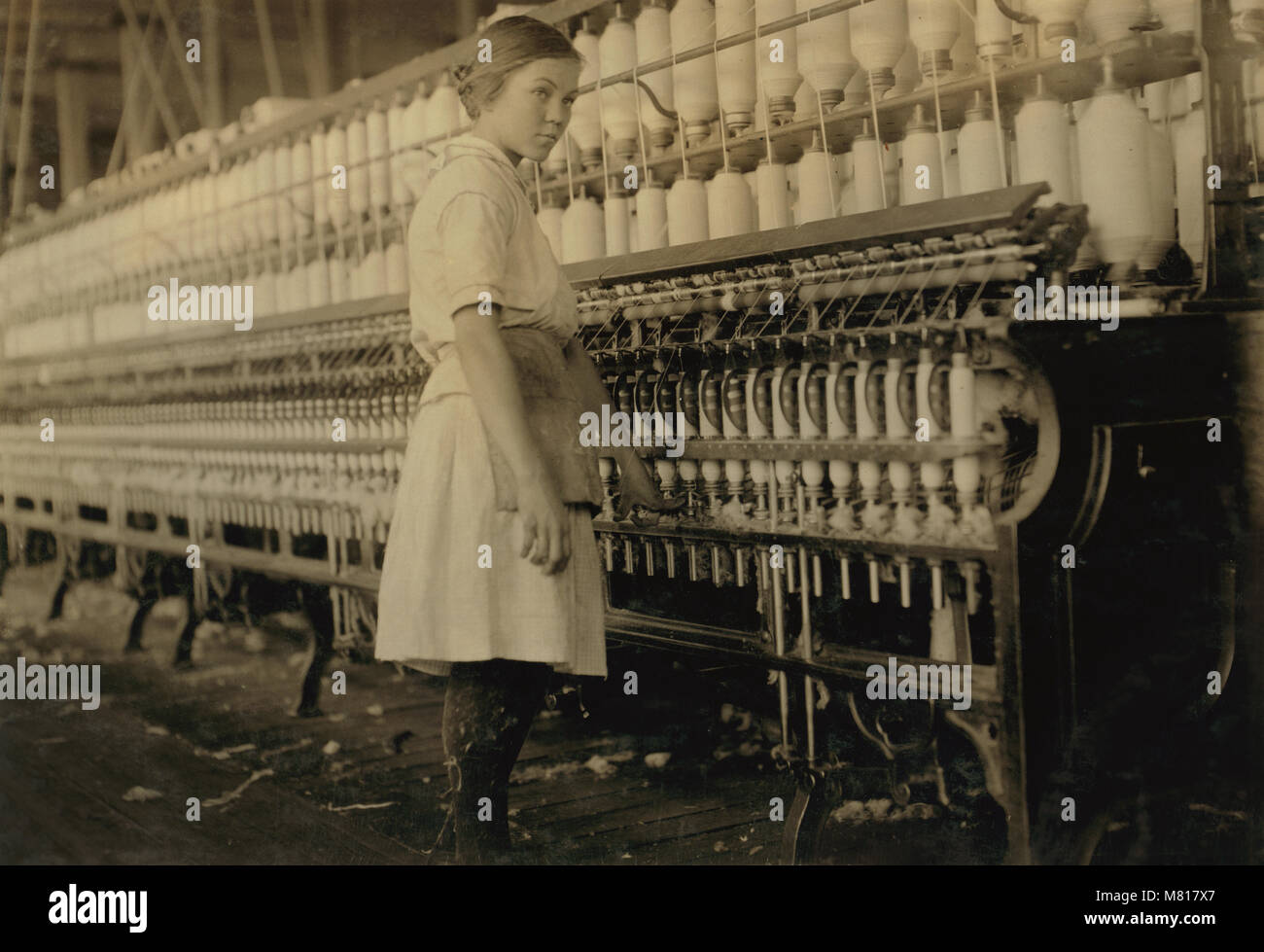 14-year-old Spinner, Full-Length Portrait, Brazos Valley Cotton Mill, West, Texas, USA, Lewis Hine for National Child Labor Committee, November 1913 Stock Photo