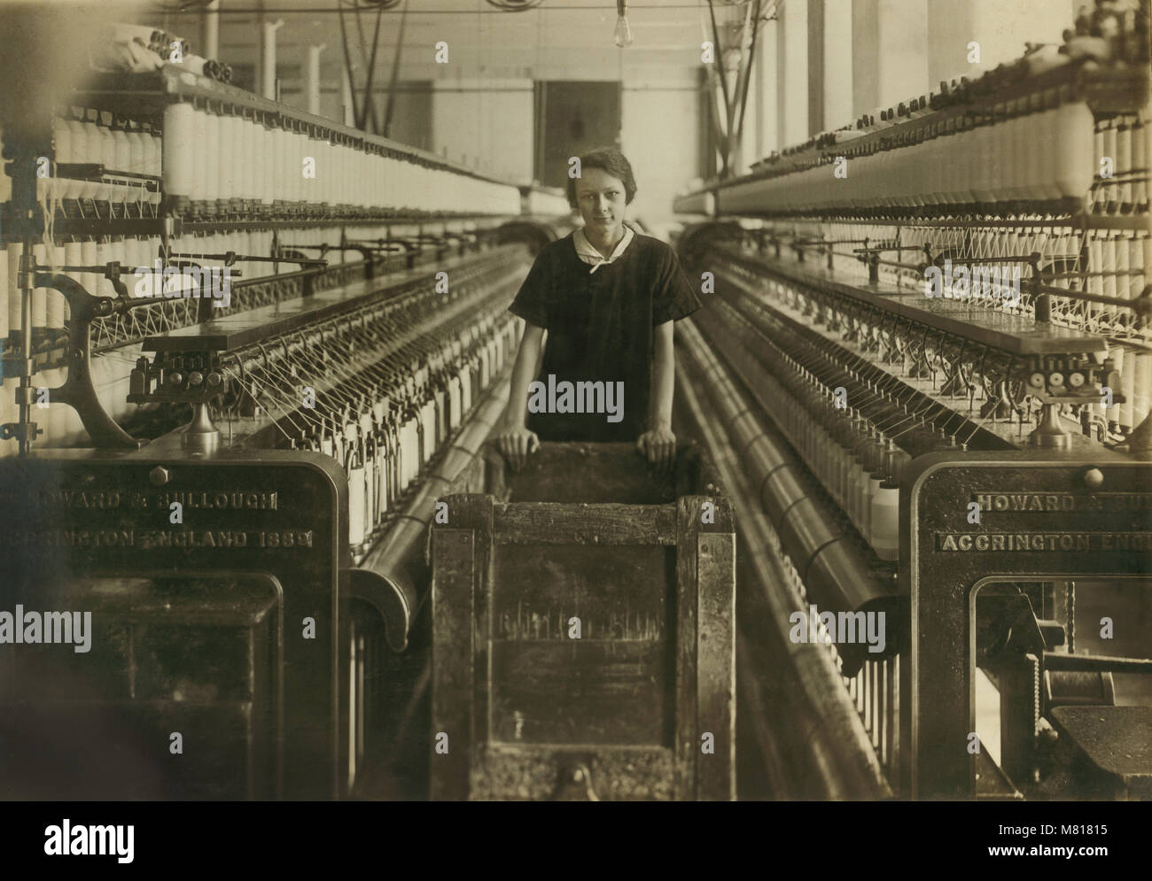 14 Year Old Doffer Pushing Cart Of Empty Bobbins In Card