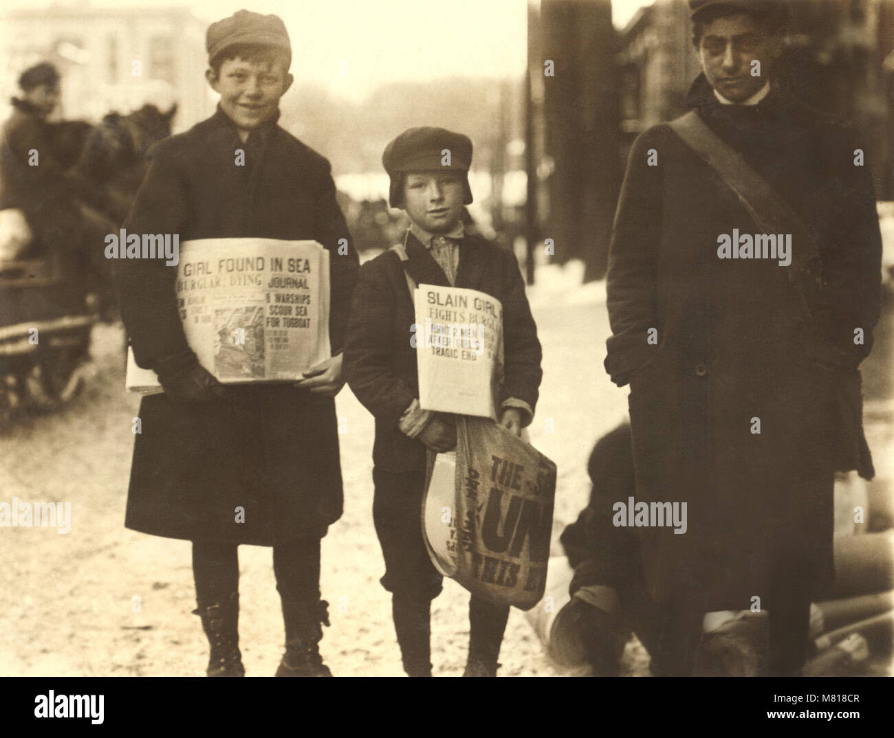 Three Newsboys Selling Newspapers in Winter, Schenectady, New York, USA