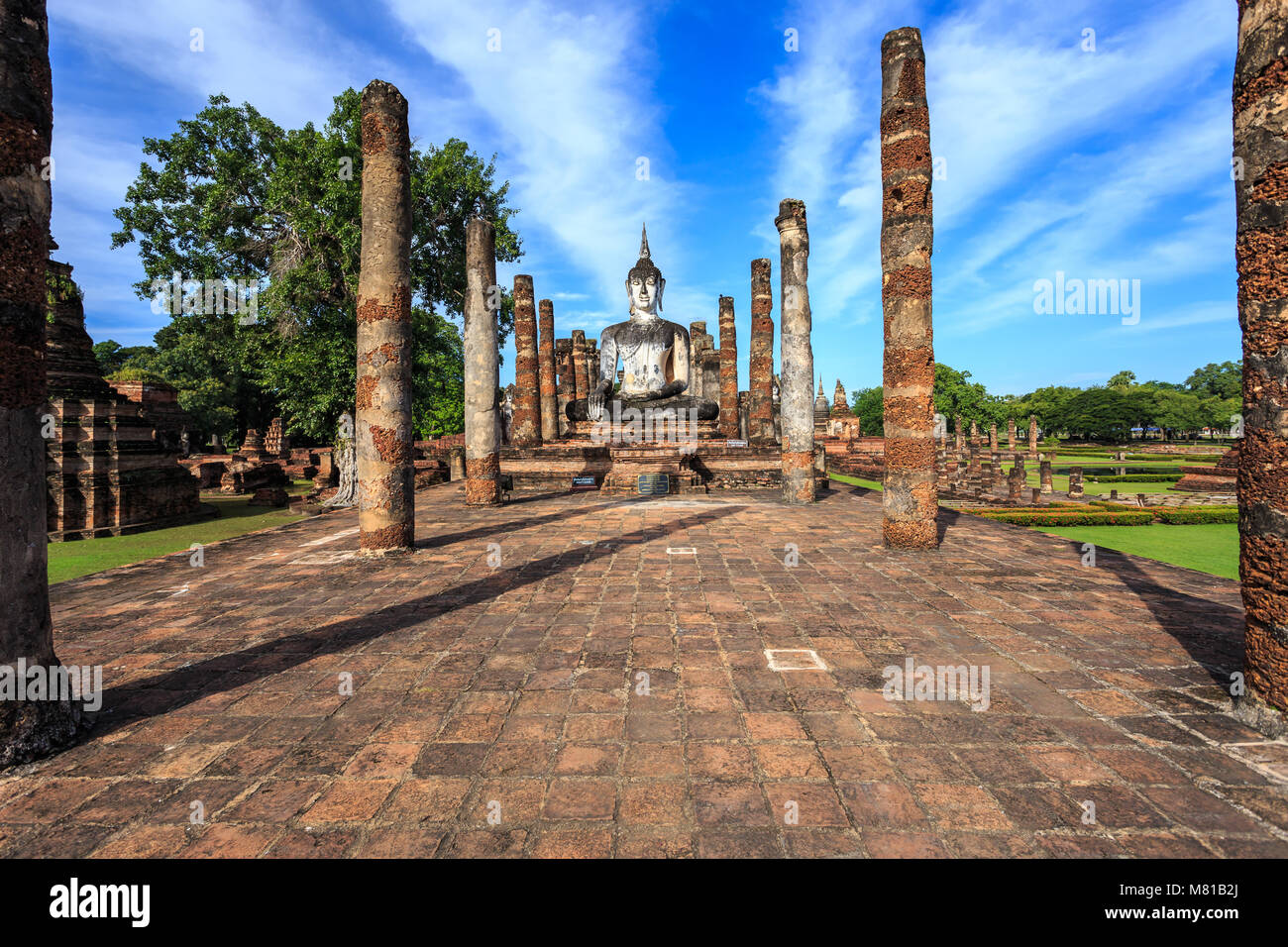 Sukhothai Historical Park at day time, Sukhothai province. Located in a beautiful setting of lawns, lakes and trees in north-central of Thailand Stock Photo