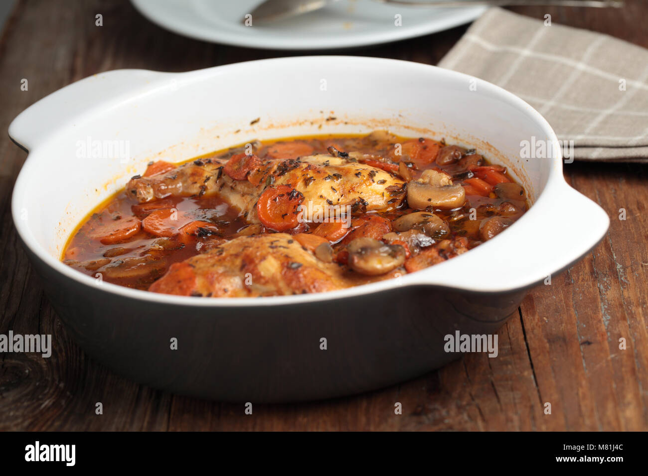 Hunters rabbit stew with carrot in a pan Stock Photo