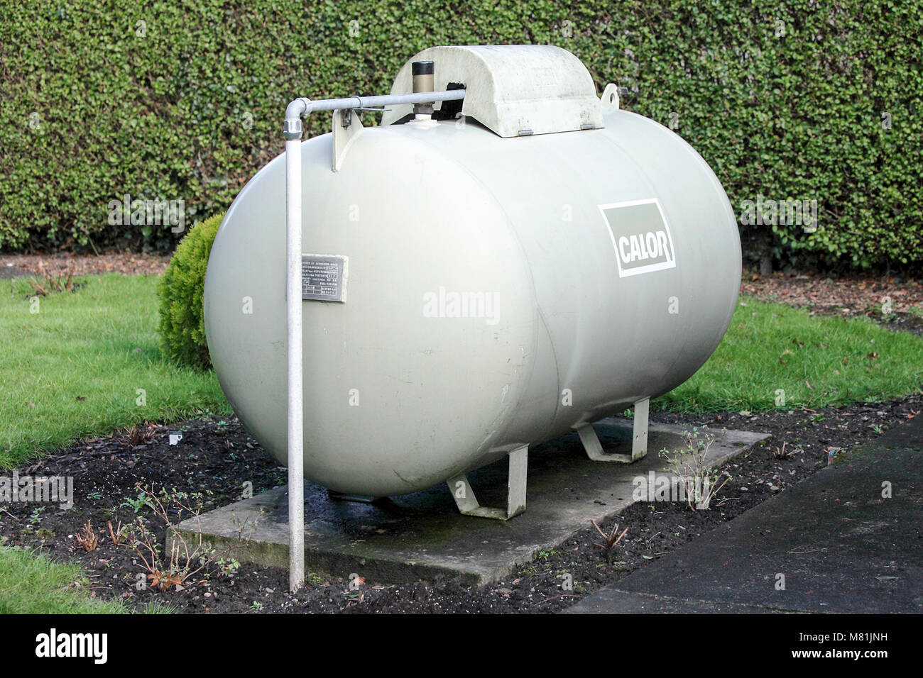 Viewed here at photographers home is a calor gas tank, situated in his garden in Shropshire. Stock Photo