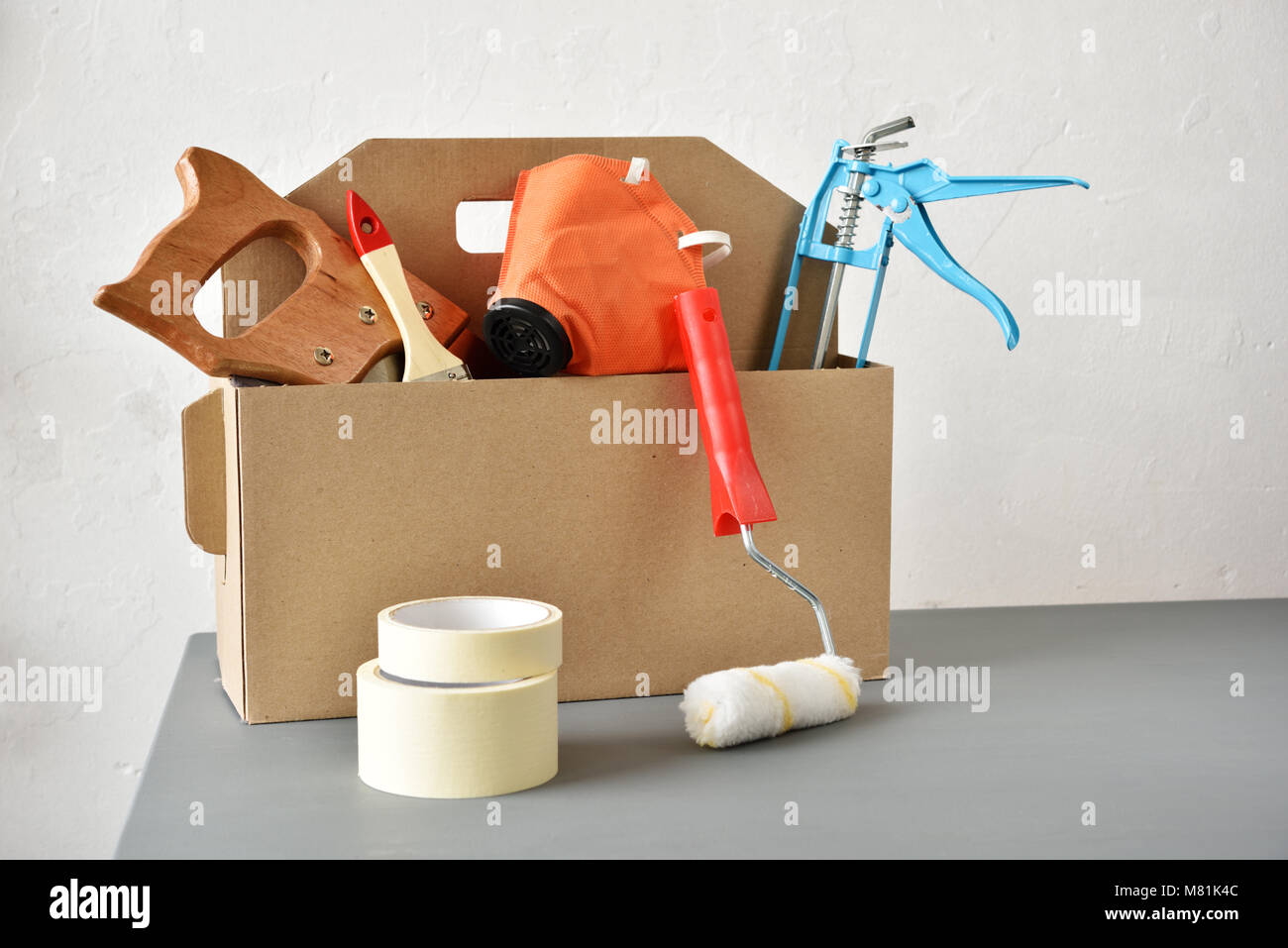 Cardboard toolbox with a set of tools Stock Photo Alamy