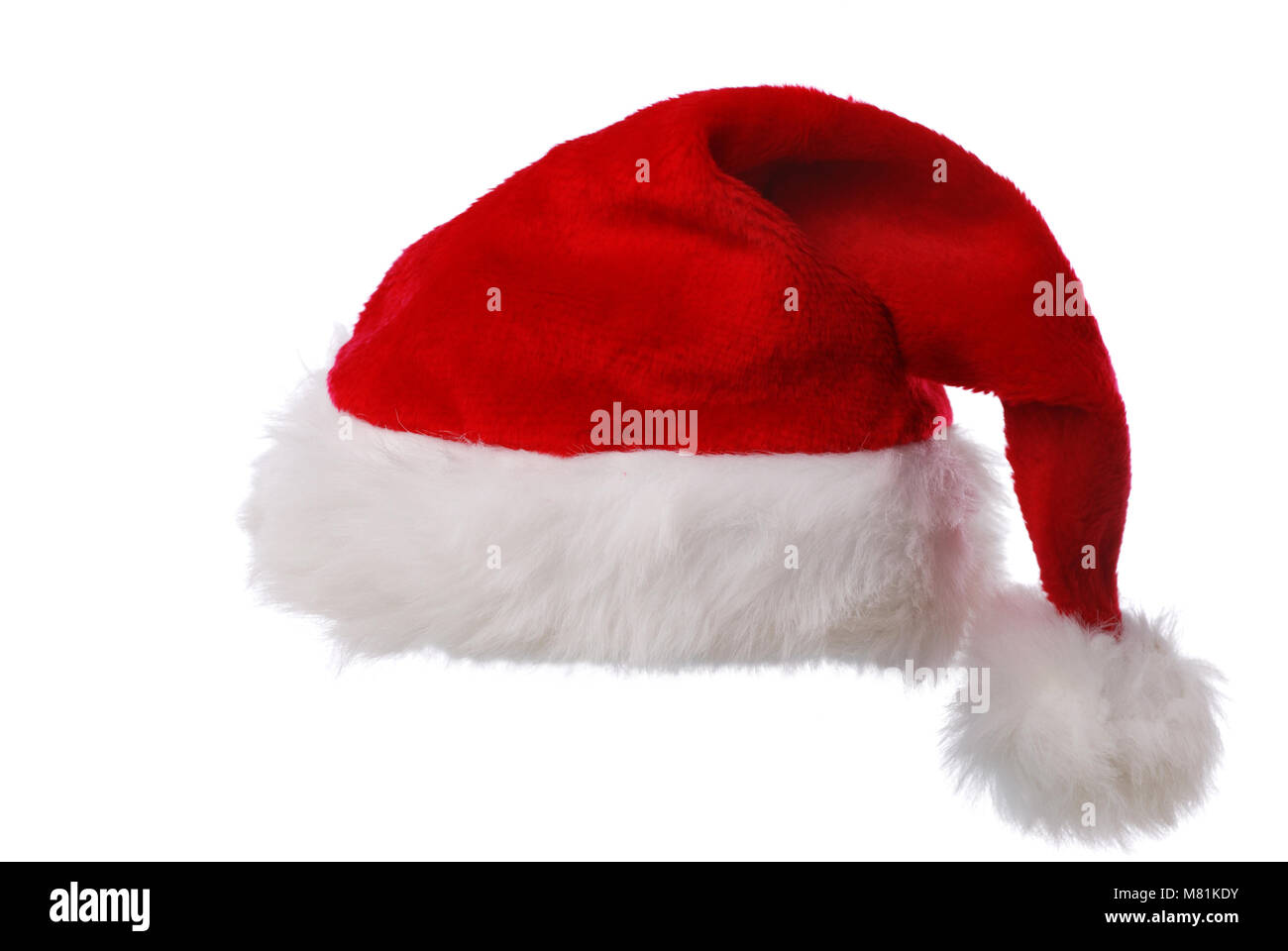 Red Santas hat against white background Stock Photo - Alamy