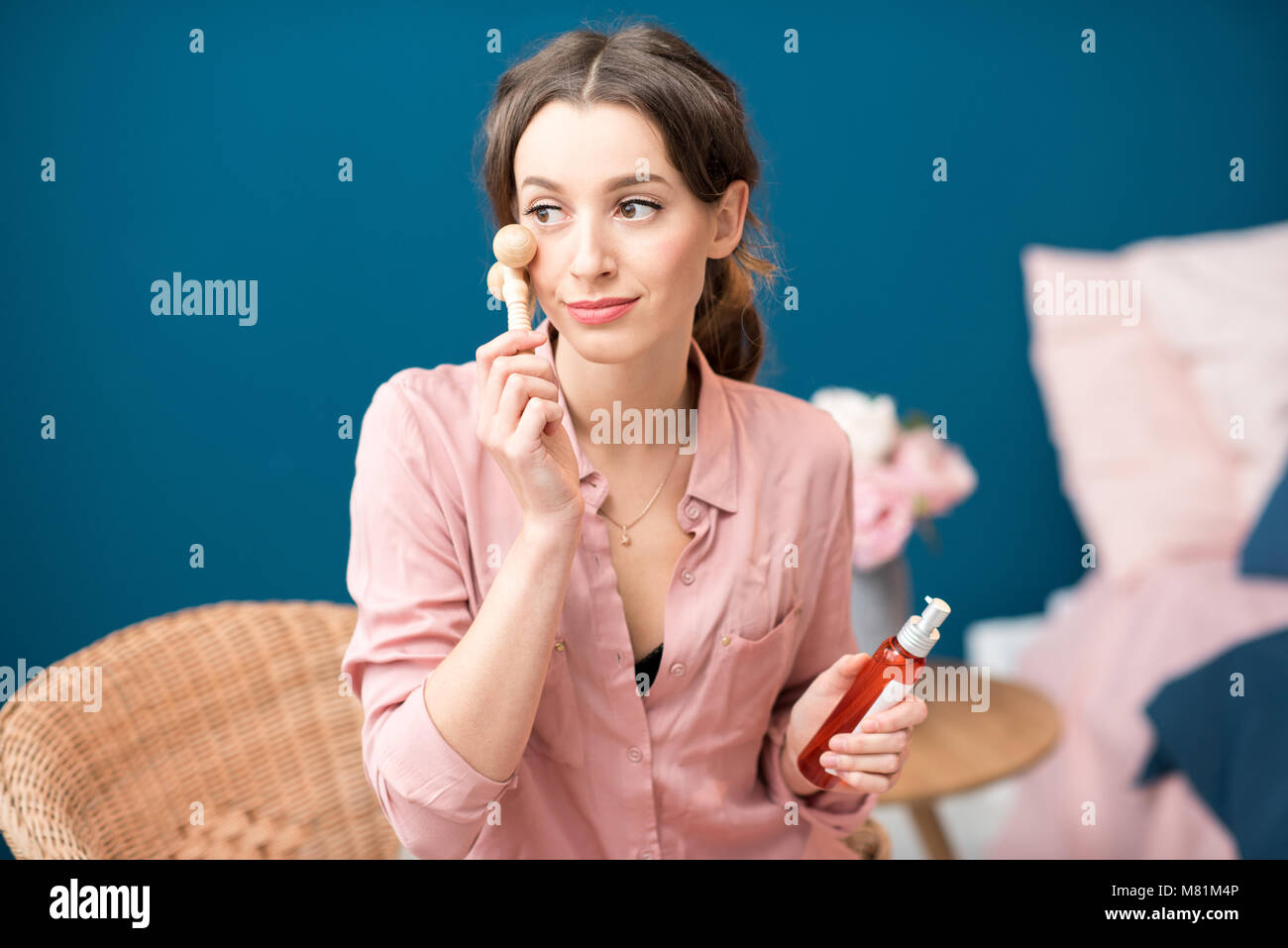 Woman applying facial massage Stock Photo Alamy