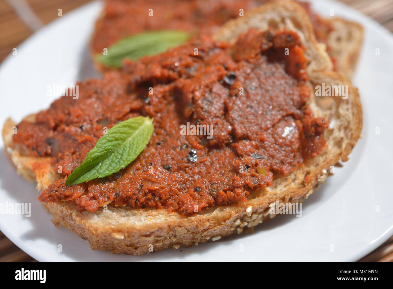 Sandwich with tomato and pepper spread Stock Photo Alamy