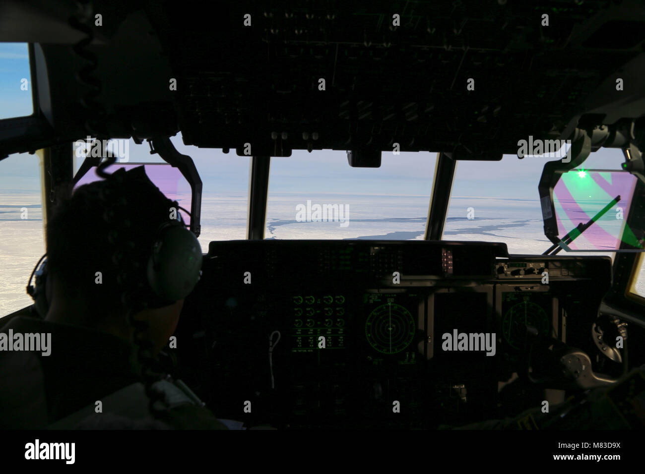 211 Rqs Alaska National Guardsmen conduct an air drop mission via a 211th ...