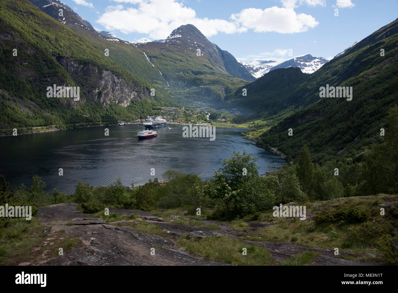 Geirangerfjord is a touristic hotspot in Norway visited by nearly 200 cruise ships like the Mein Schiff 1 in a year Stock Photo