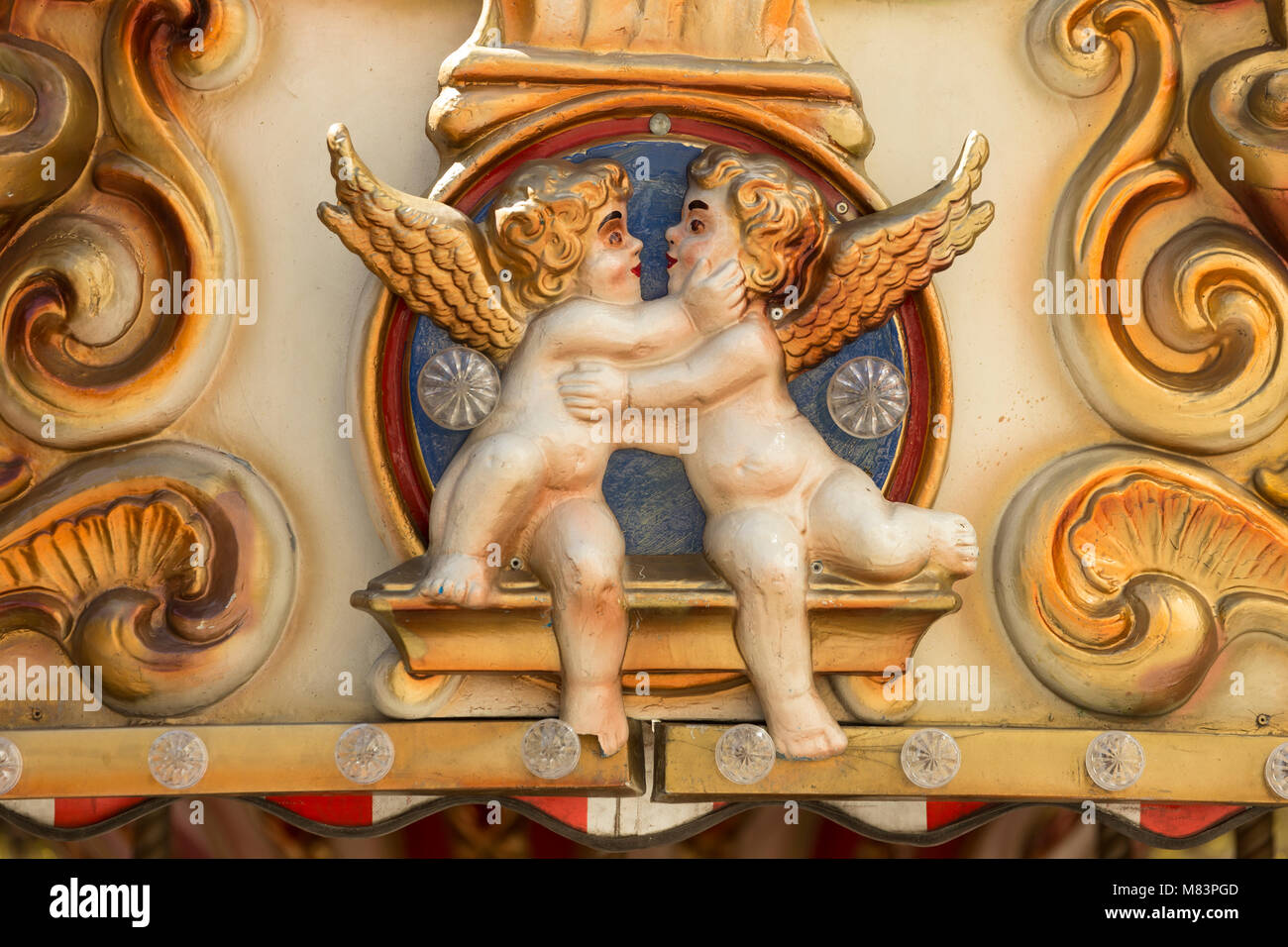 Statues of 2 angels, detail from a carousel in Vienna Stock Photo