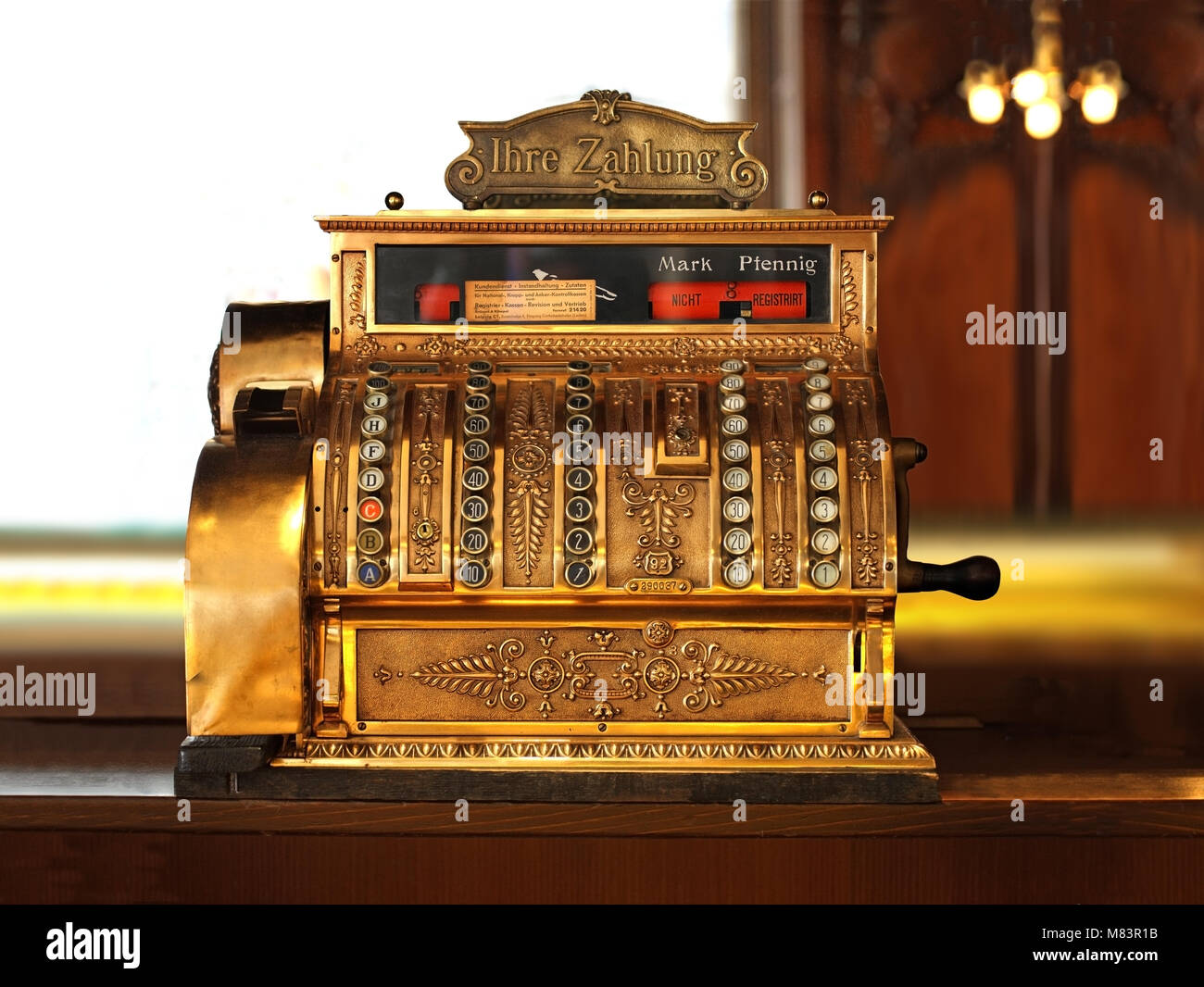 Historic Cash Register from the beginning of the 20th century, currency labels for Mark and Pfennig. Inscription on upper sign: 'Ihre Zahlung' ('Your Stock Photo