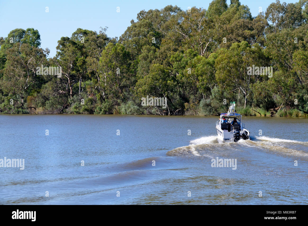 Police boat patrolling the Murray River, New South Wales, Australia. Stock Photo