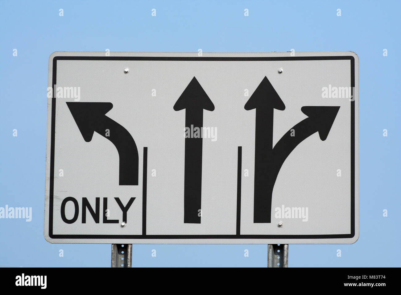 a sign with three arrows on it. Stock Photo