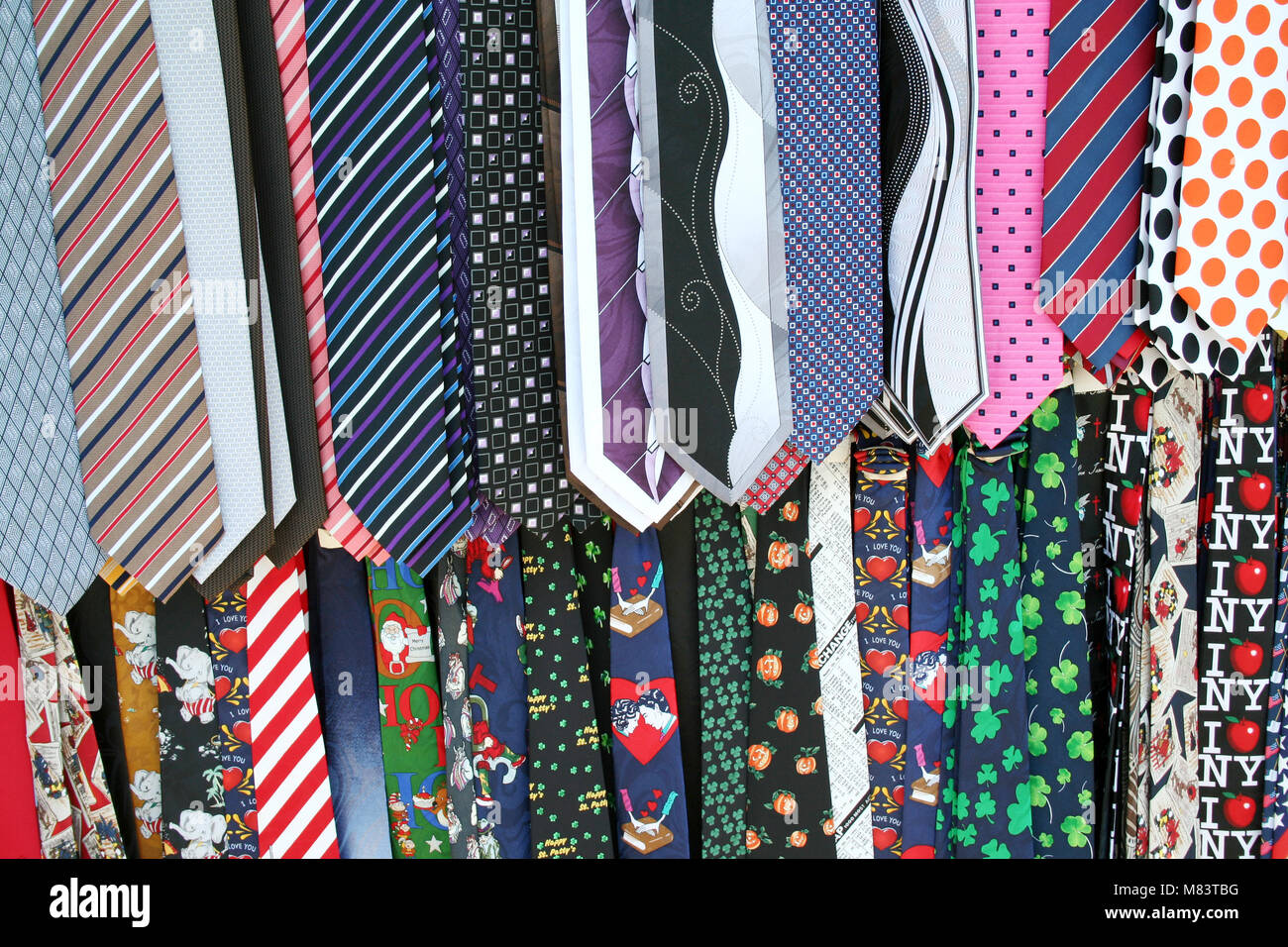 Hanging colorful Mens Neck Ties at the flea market Stock Photo