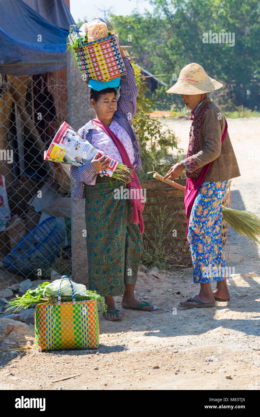 Burmese woman shopping at Nam Pan five day market, Inle Lake, Shan State, Myanmar (Burma), Asia in February Stock Photo