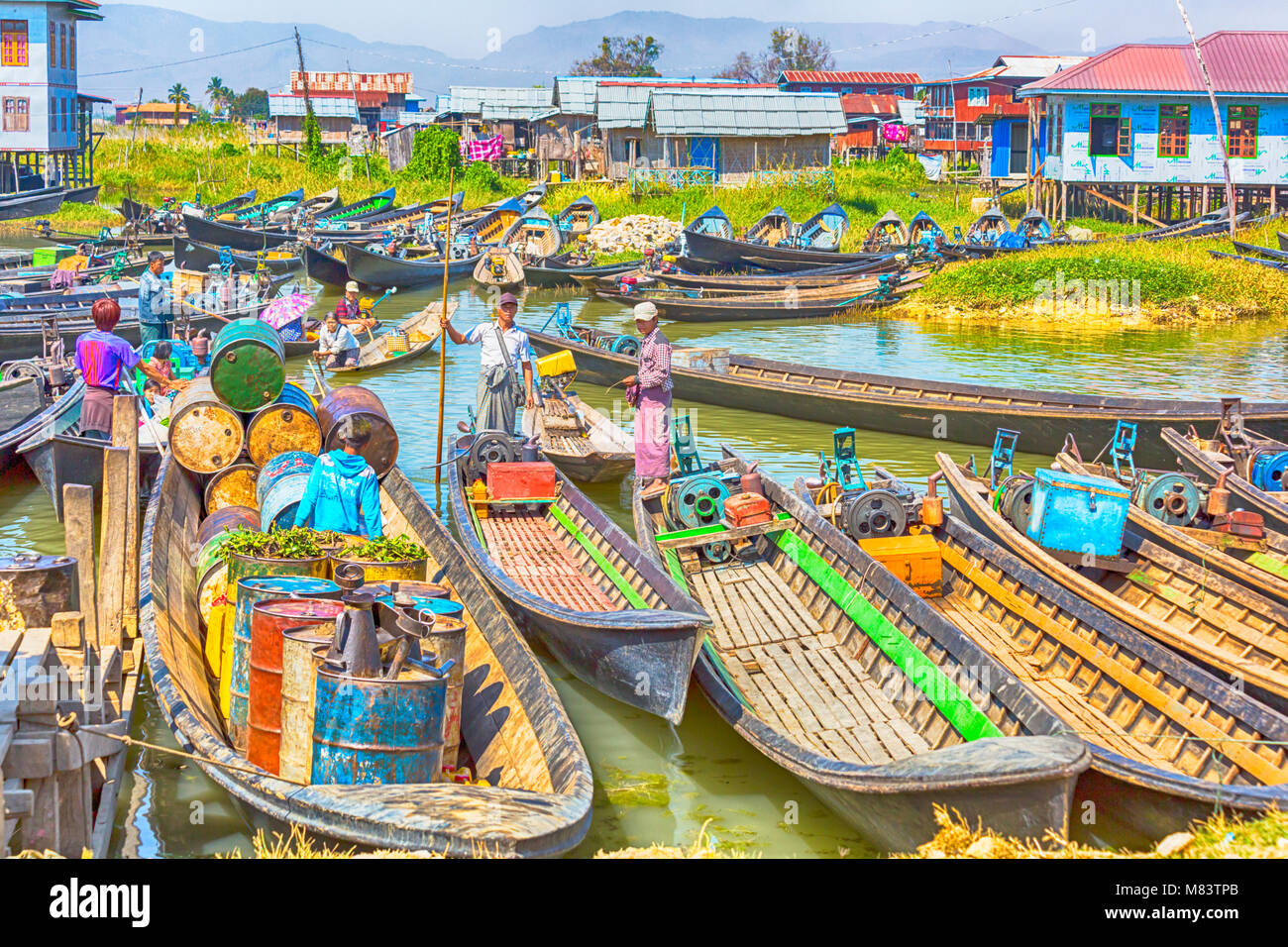 Longboats visit Nam Pan five day market, Inle Lake, Shan State, Myanmar (Burma), Asia in February Stock Photo