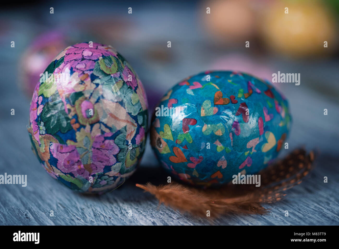 Closeup Of Some Homemade Decorated Easter Eggs On A Gray Rustic
