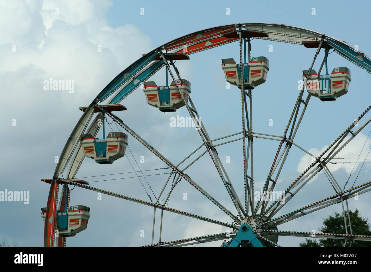 Ferris wheel against bule sky with clouds Stock Photo - Alamy