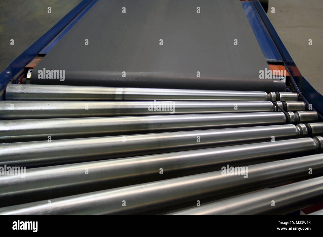an image of some Conveyor Rollers and belt Stock Photo