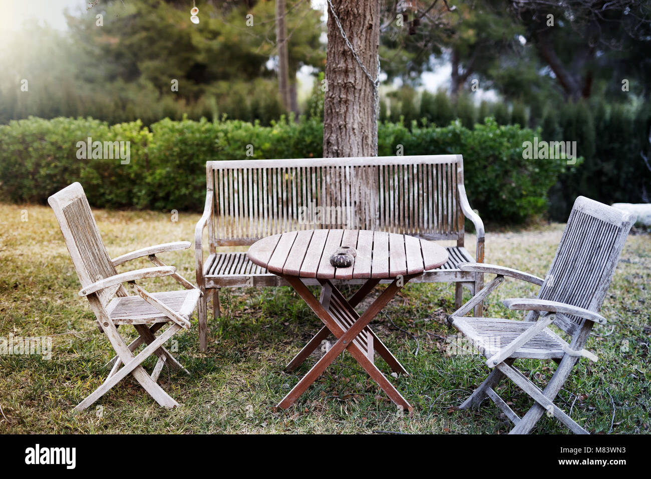 old wooden table in the garden Stock Photo