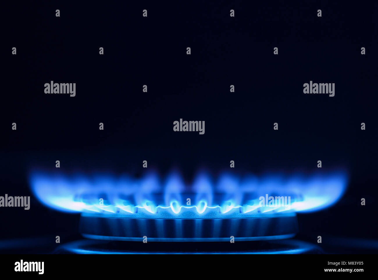Gas Flame on a Cooker Hob, Close Up Stock Photo