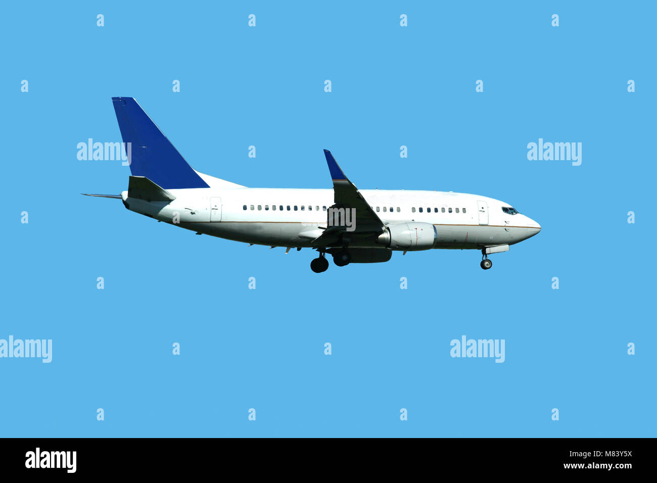A Passenger jet plane landing Stock Photo