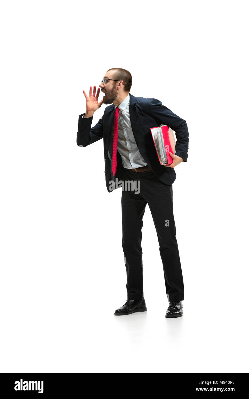 Do not miss. Young casual man shouting. Shout. Crying emotional man screaming on white studio background Stock Photo