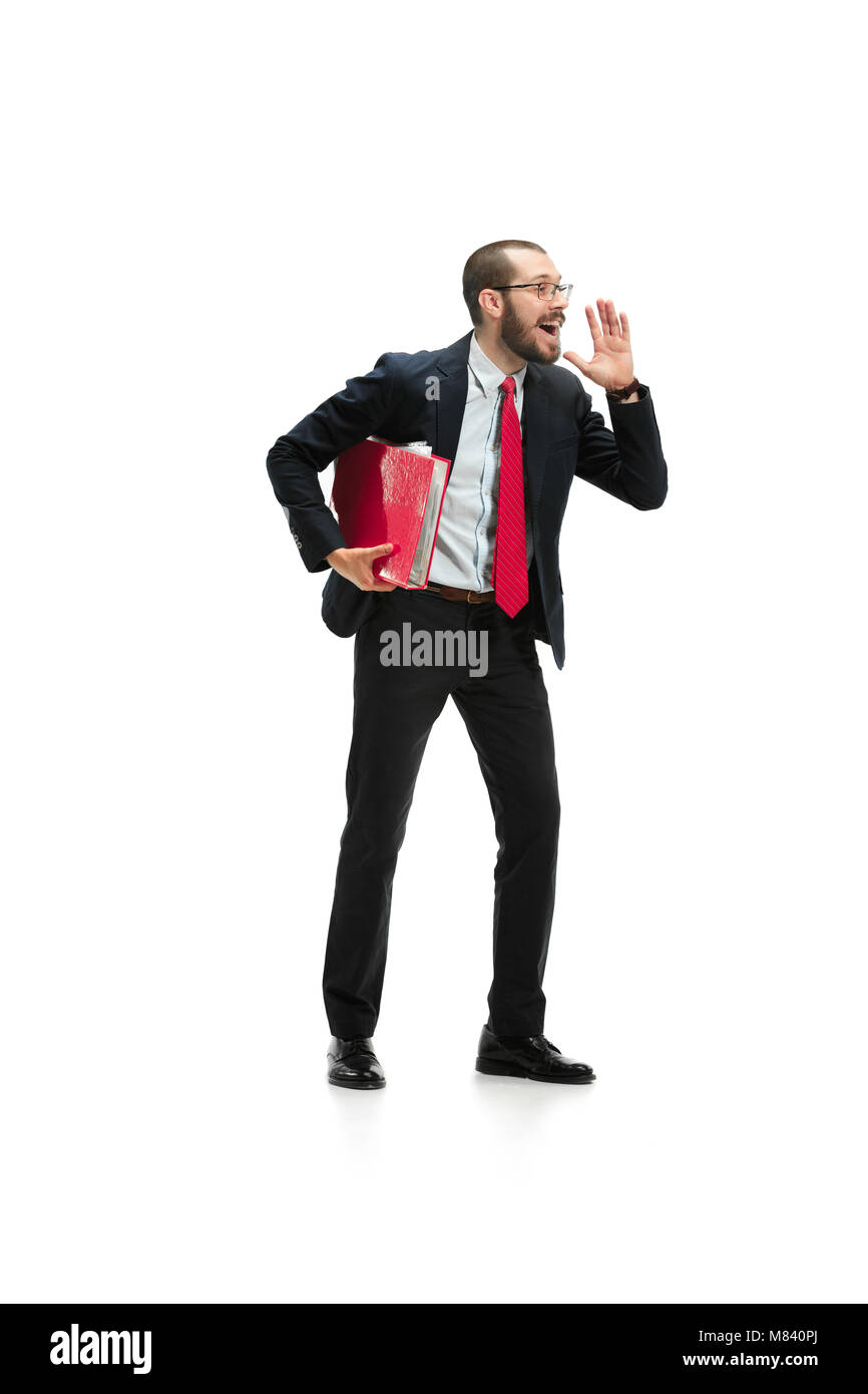 Do not miss. Young casual man shouting. Shout. Crying emotional man screaming on white studio background Stock Photo