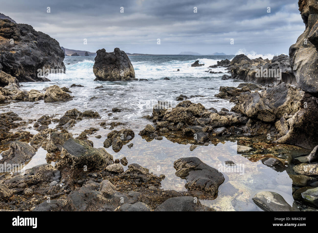 Rock beach near Orzola, Lanzarote, Canary Islands, Spain Stock Photo