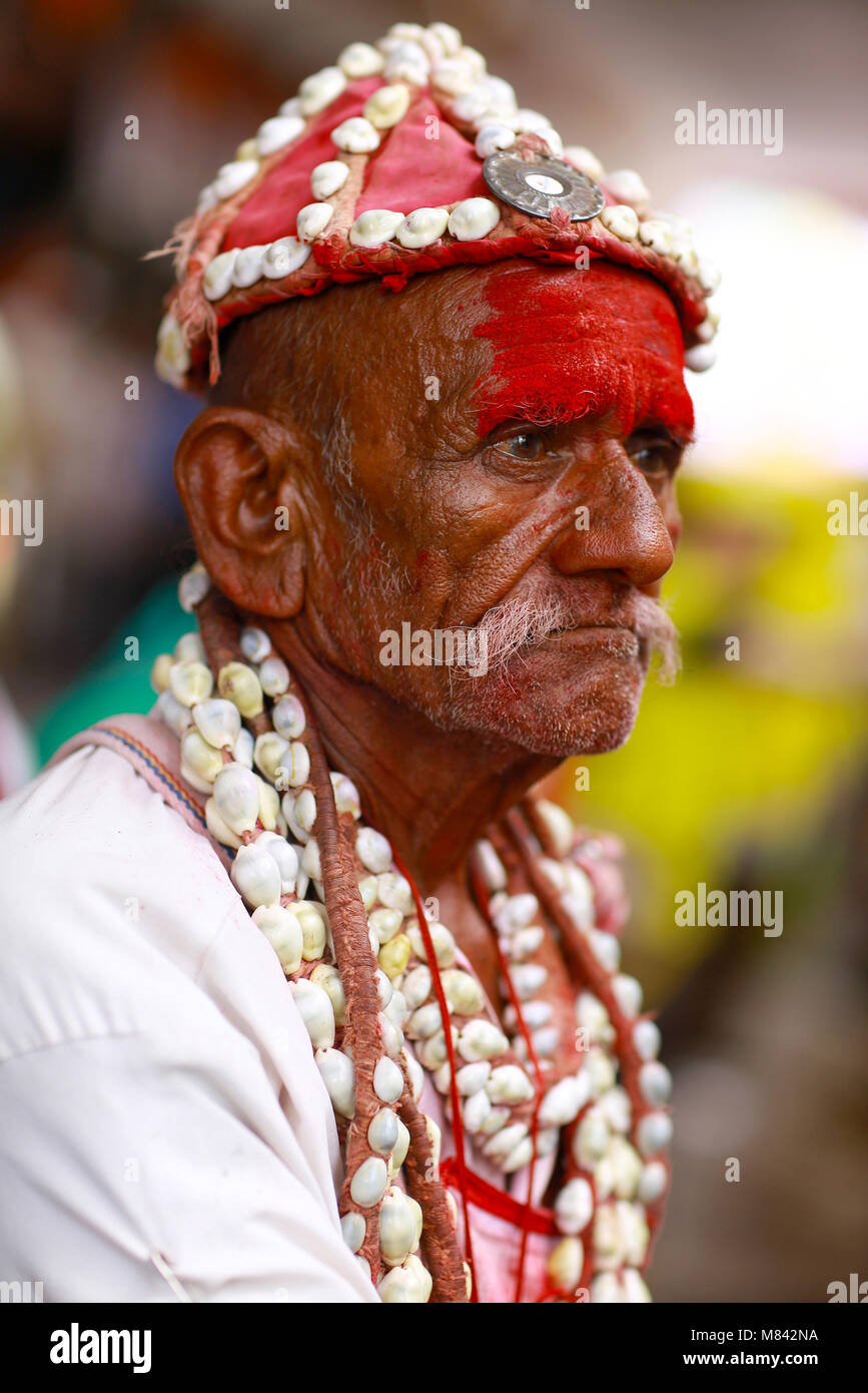 Man with bead cap and necklace and vermillion on head. Pandharpur festival Stock Photo