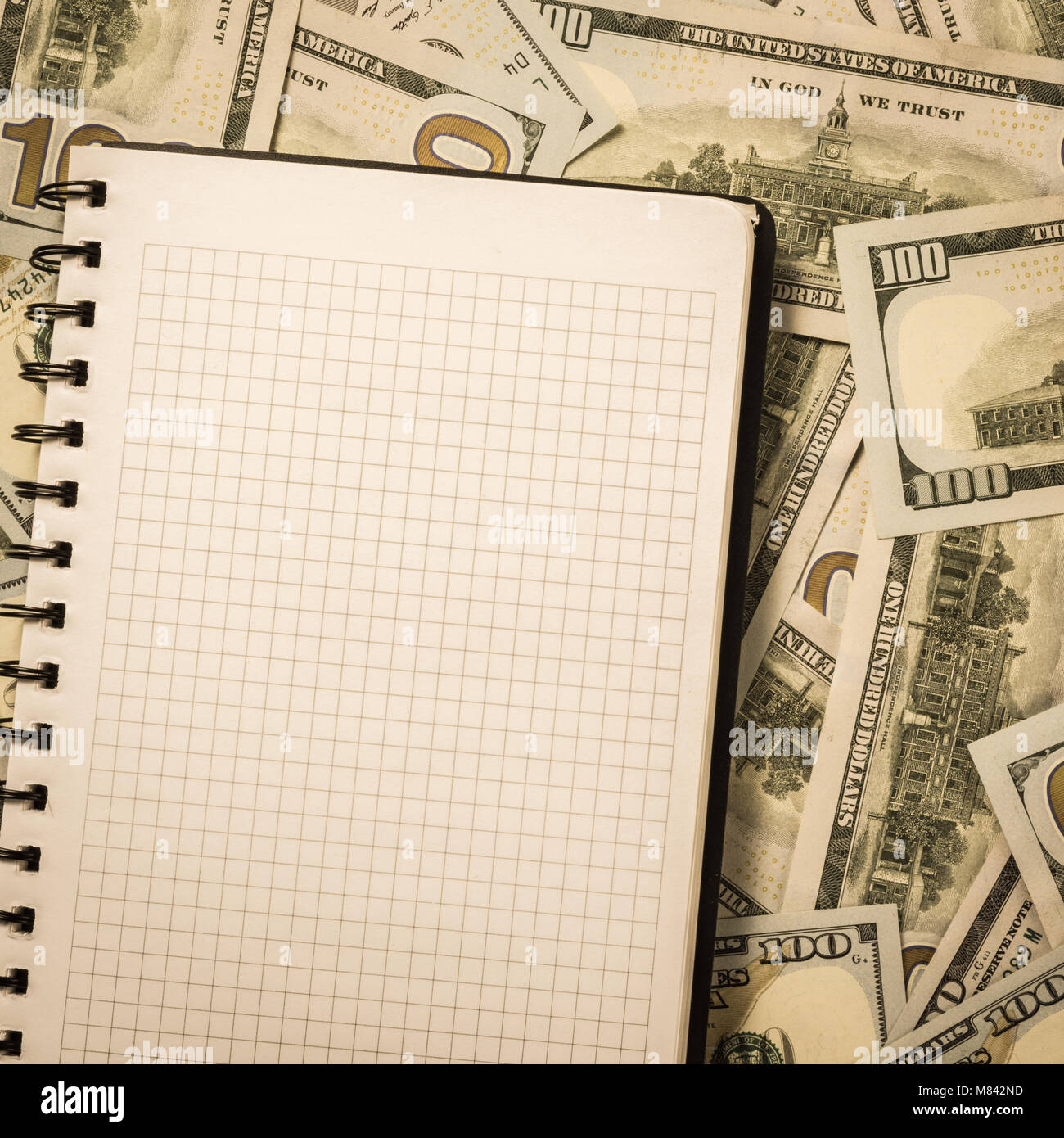 Accounting notebook for notes lying on money background Stock Photo Alamy