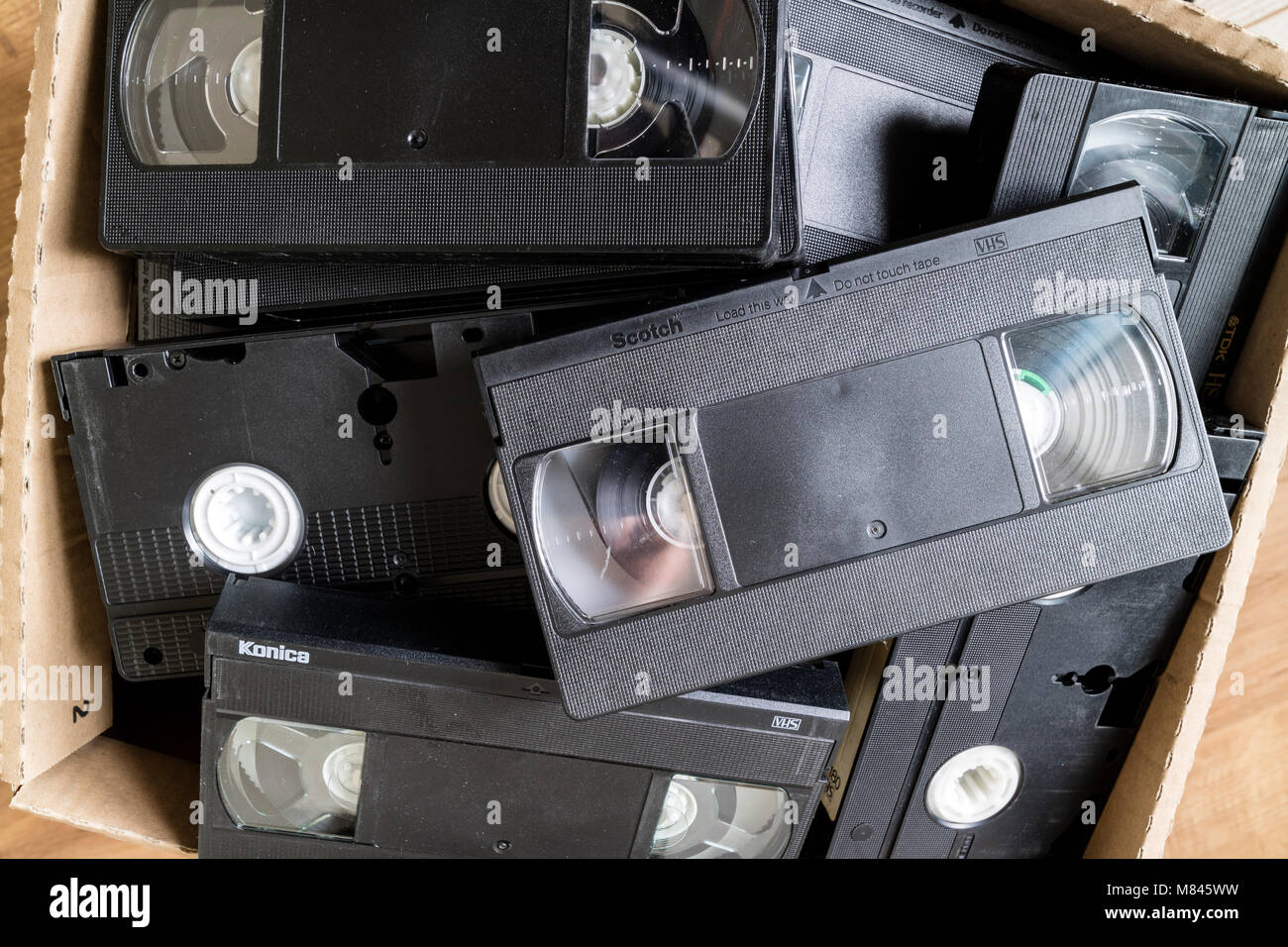 A Box of Old Video Tapes That Need to be Recycled But Cannot be Placed