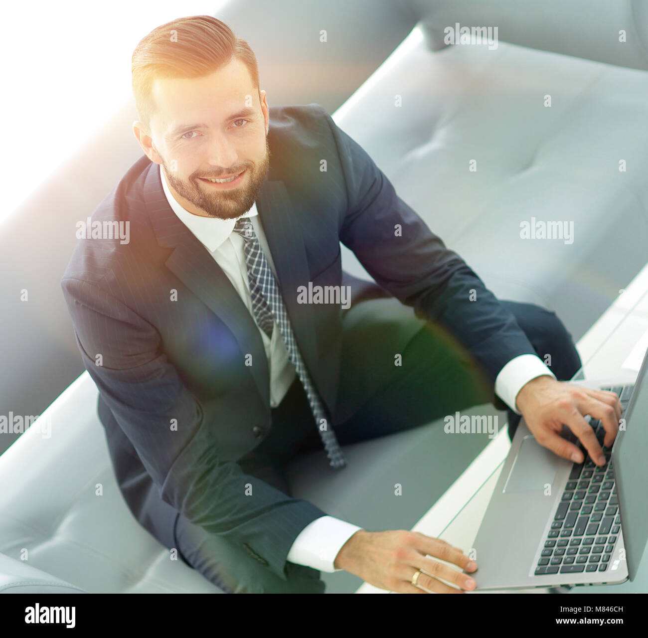 Top view of businessman working on laptop in office Stock Photo - Alamy