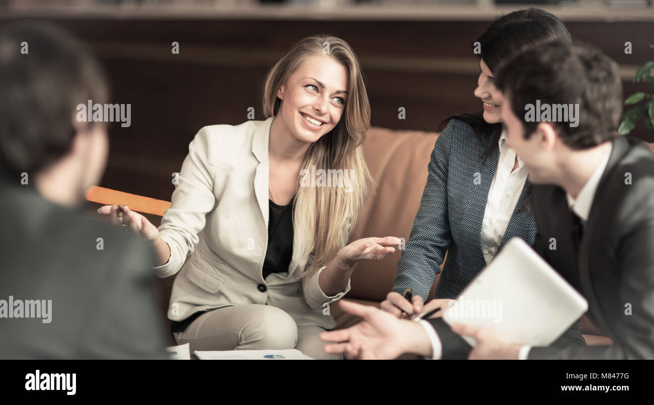 A group of successful businessmen. Discussion of an important issue with colleagues Stock Photo