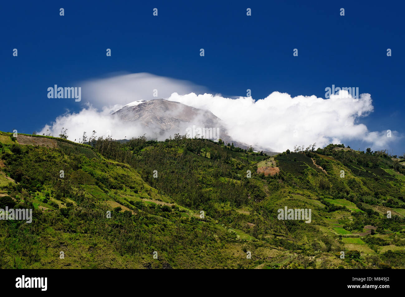 Beautiful landscape in cloud forest near Banos, one of Ecuadors most enticing and popular tourist destination. Volcano Tungurahua Stock Photo