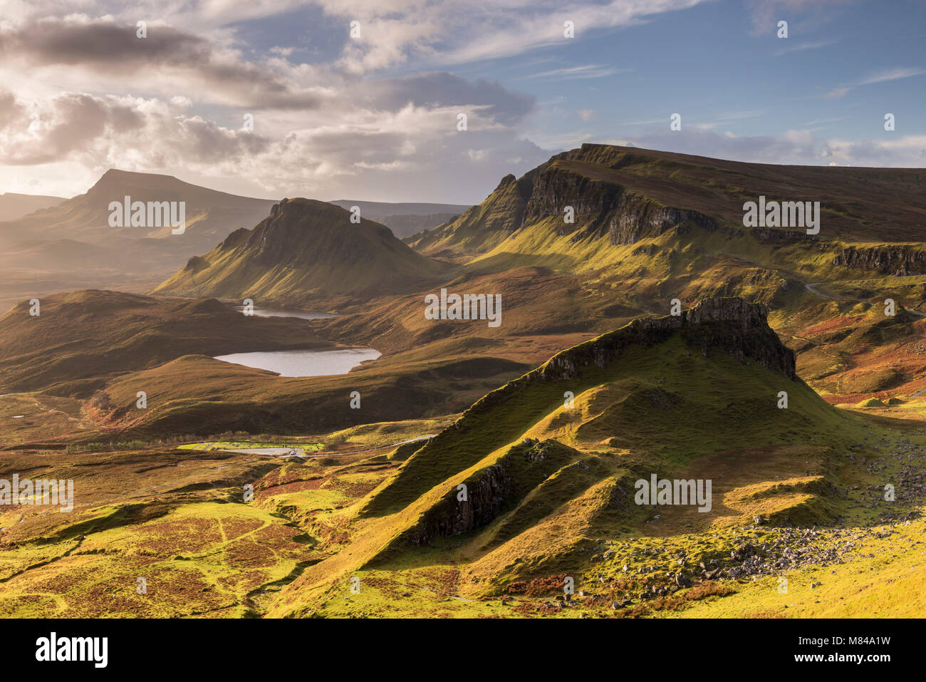 Morning sunlight on the Trotternish Mountains from the Quiraing, Isle of Skye, Scotland. Autumn (November) 2017. Stock Photo