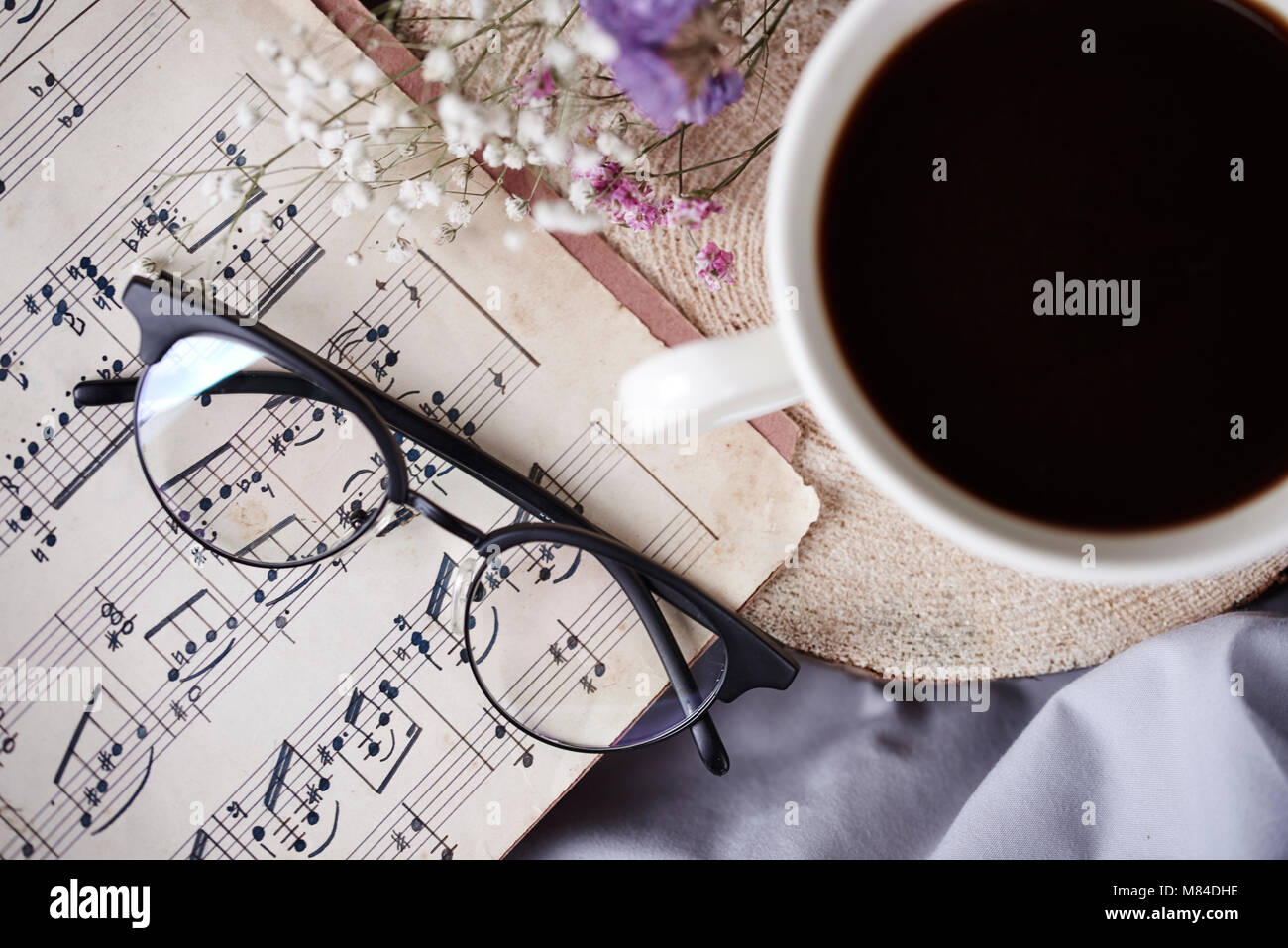 Black Coffee And Music Note At Bedroom Stock Photo