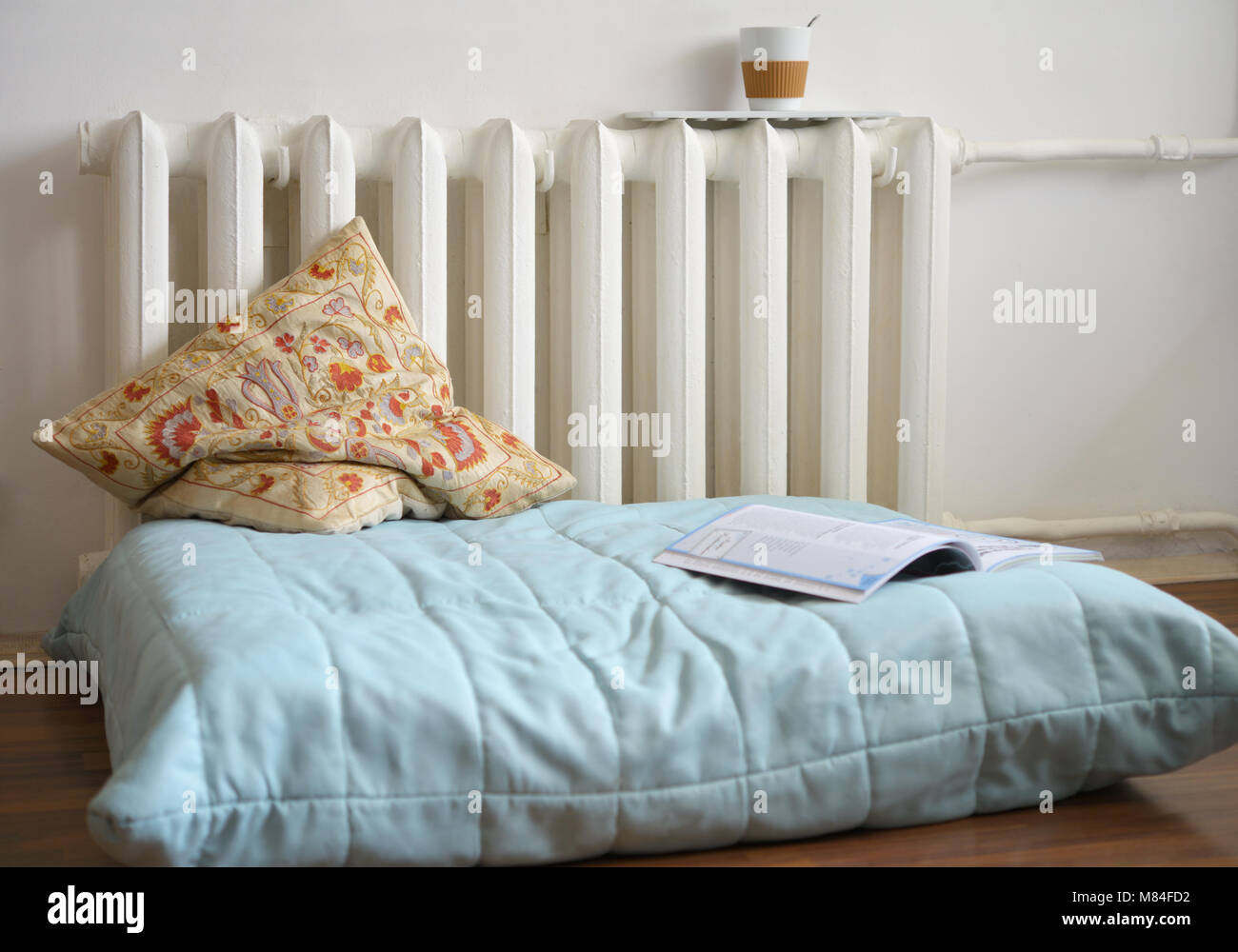 pouffe-against-a-heater-in-a-living-room-stock-photo-alamy