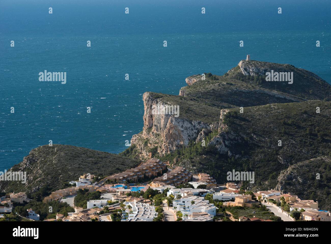 Cap d'Or tower and cliffs, Moraira,Costa Blanca, Alicante province, Spain, Europe Stock Photo