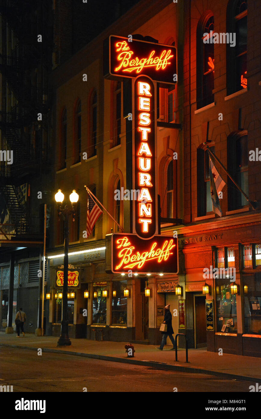 Neon sign to the iconic Berghoff Restaurant, the 4th generation family business has served beer and German food in Chicago's downtown Loop since 1898. Stock Photo
