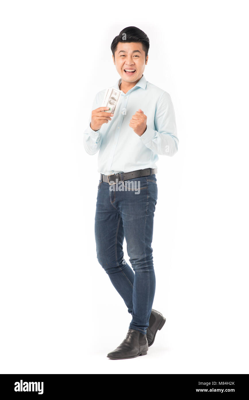 Asian man holding money Stock Photo