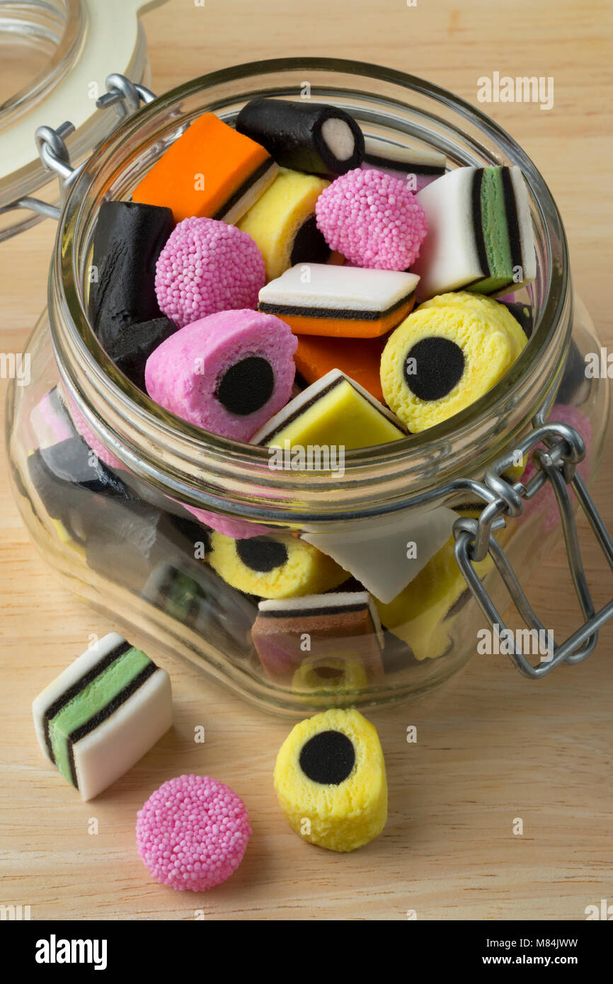 Glass jar with colorful Liquorice allsorts Stock Photo