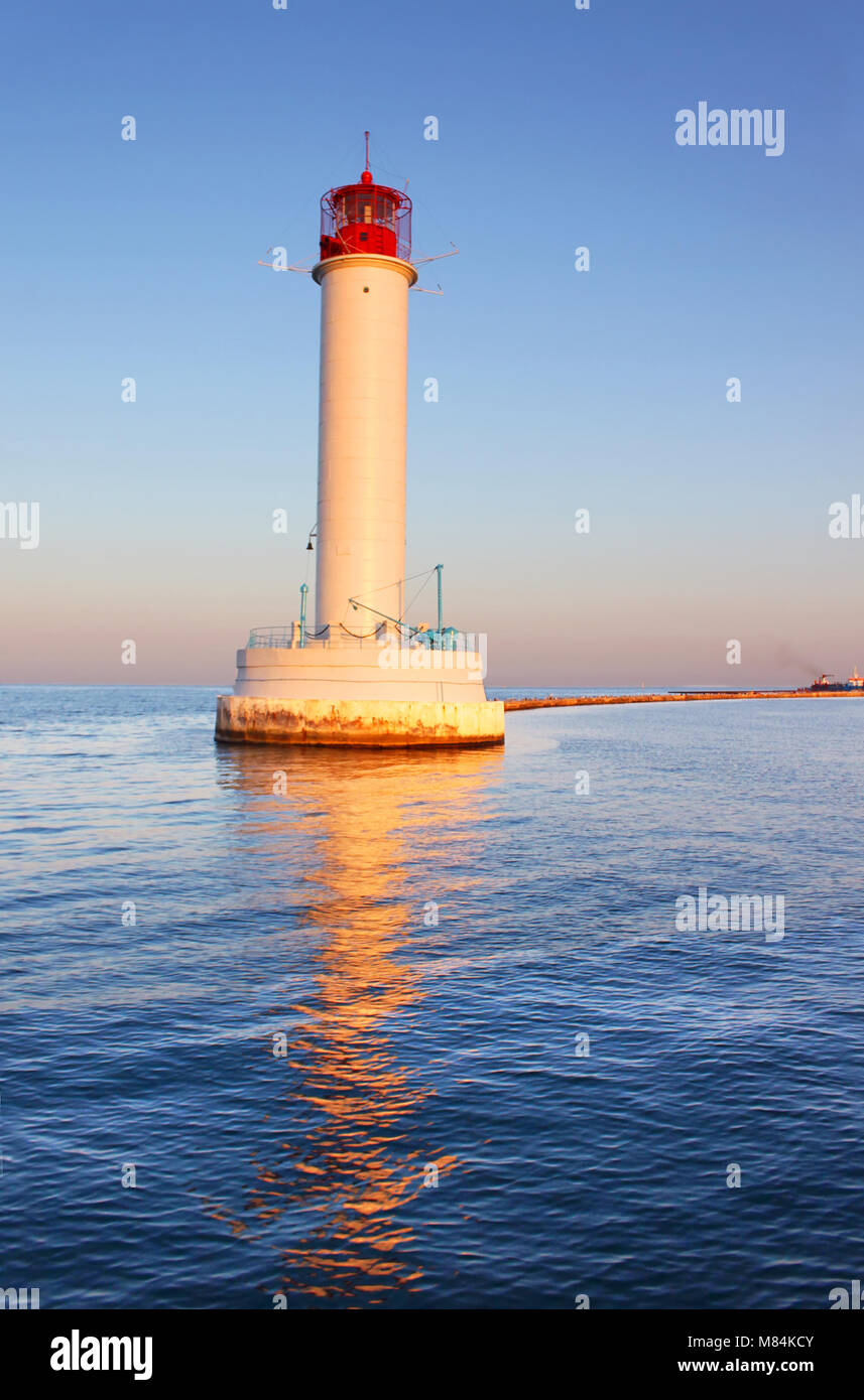 Operating lighthouse in Odessa in the evening. Ukraine. Black sea Stock Photo
