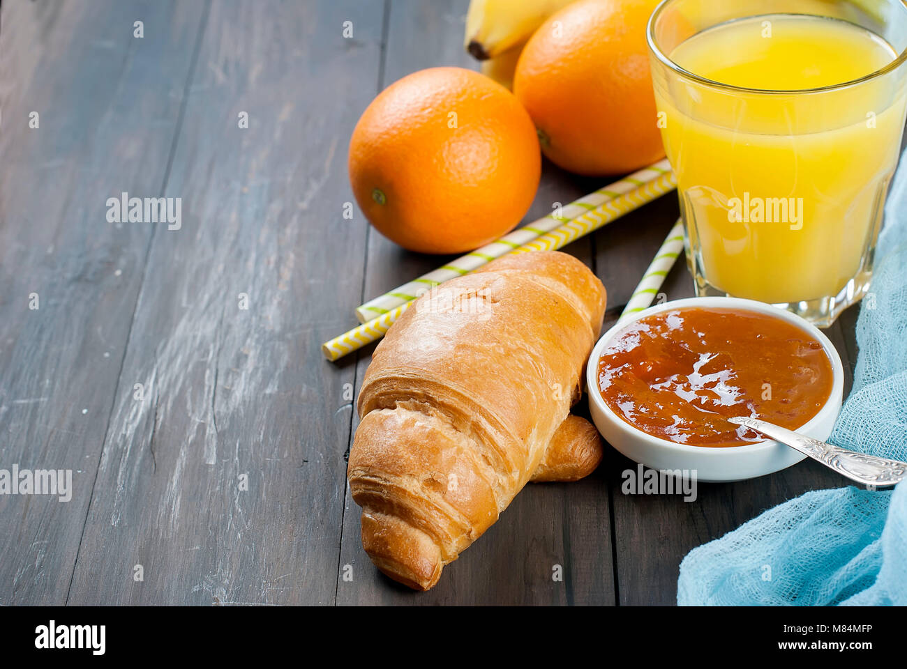 Healthy breakfast with oatmeal with butter,croissant, jam, coffee and ...