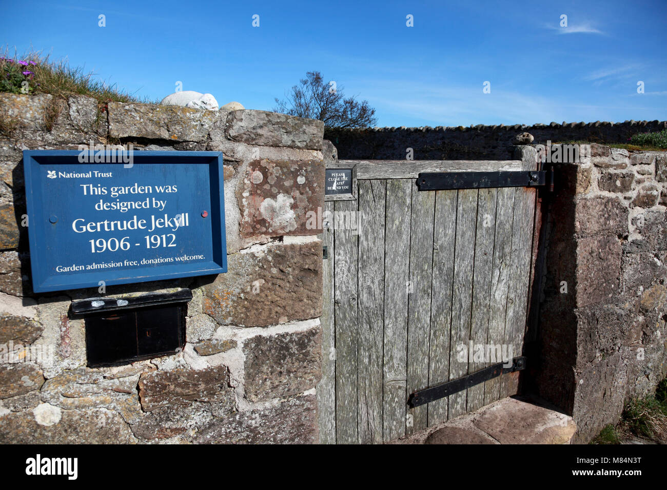 The entrance to the walled garden designed by Gertrude Jekyll on Lindisfarne, Holy Island Stock Photo
