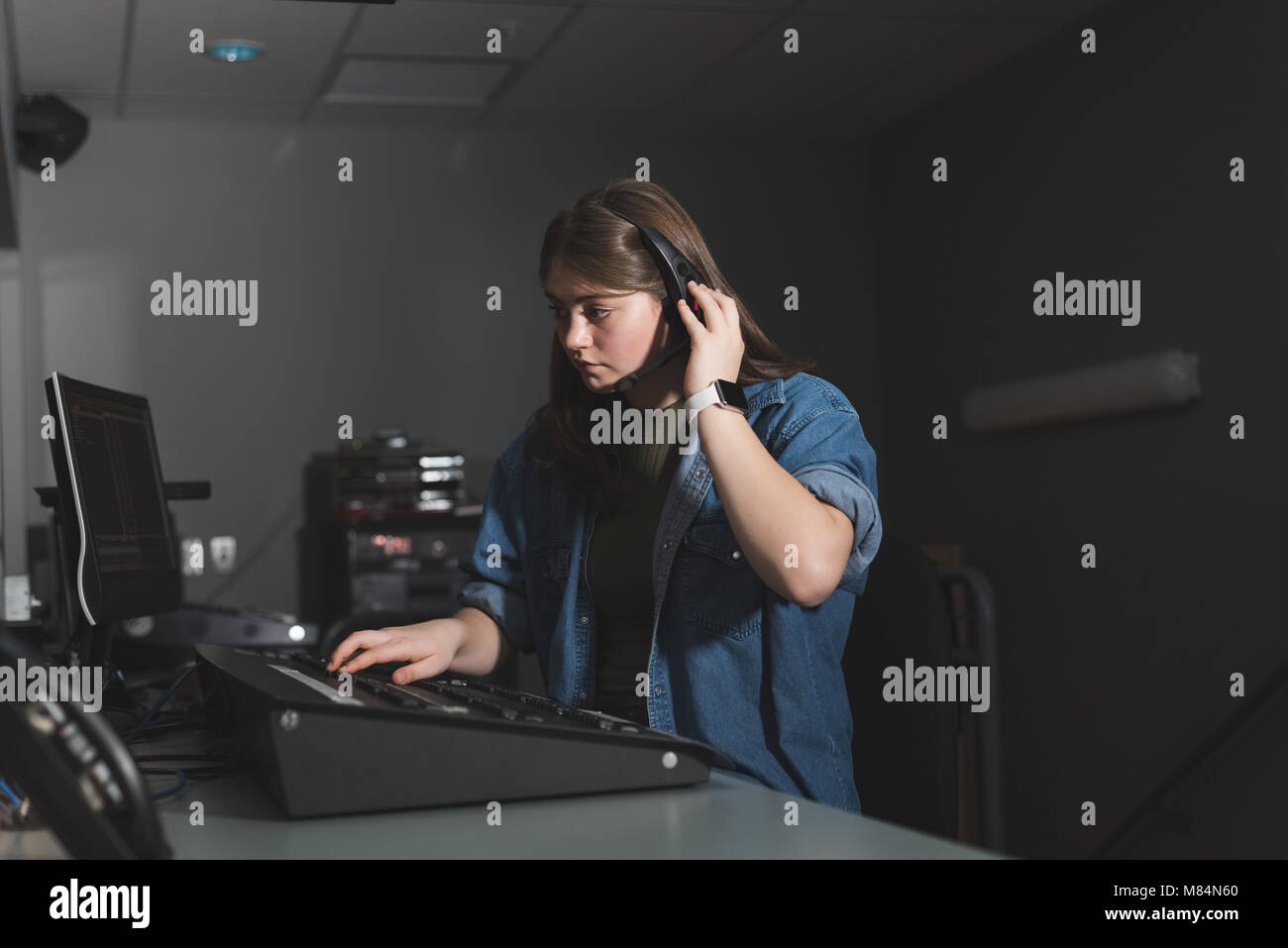 Female sound recordist working in theater Stock Photo Alamy